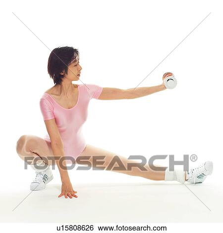 A woman in Leotard exercising with a dumbbell, Side View View Large Photo Image Stock Photograph - A woman in Leotard exercising with a dumbbell, Side View. Fotosearch