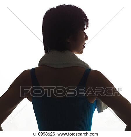 Stock Photograph - A woman in Leotard, Rear View, Silhouette. Fotosearch