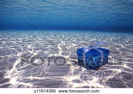 Stock Photography - Present in the sea. Fotosearch