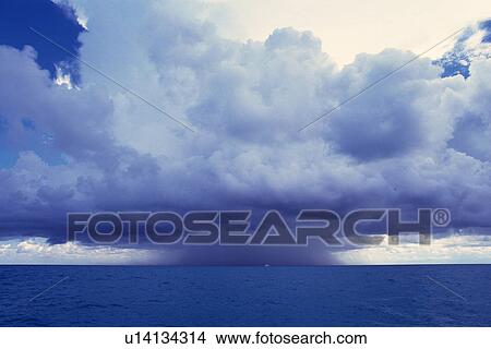 a Huge White Clouds Spreading Over the Ocean, Front View, Bahamas, North America View Large Photo Image Picture - a Huge White Clouds Spreading Over the Ocean, Front View, Bahamas, North America. Fotosearch