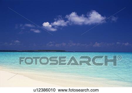 Stock Image -  a Maldivian Beach With Its White Sand and Its Clear Ocean water, Maldives, Micronesia. Fotosearch