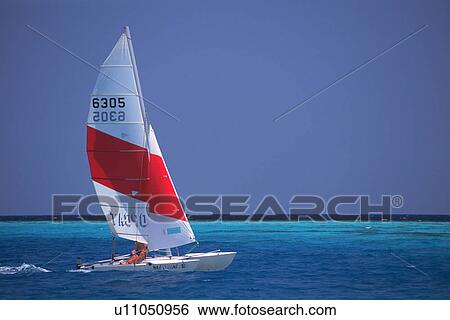 Stock Photograph -  a Yacht on the Maldivian Ocean, Side View, Maldives, Micronesia. Fotosearch