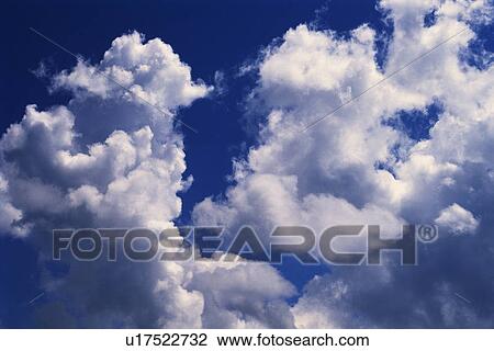 Several Huge White Clouds Floating in the Sky, Low Angle View, Bahamas, North America View Large Photo Image Stock Image - Several Huge White Clouds Floating in the Sky, Low Angle View, Bahamas, North America. Fotosearch