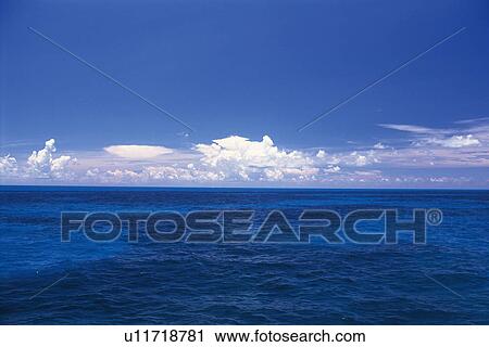 The Deep Blue Ocean Under A Blue Sky And Some Clouds Bahamas North America Stock Image U11718781 Fotosearch