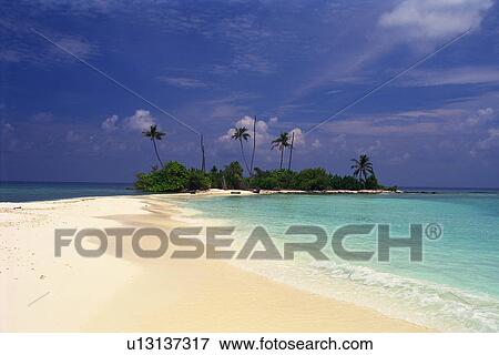 Stock Photo -  The Republic of Maldives and Its White Beach and Light Blue-colored Water, Maldives, Micronesia. Fotosearch