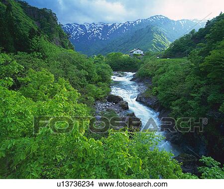 a Floating River, Surrounded By Rocks, Shrubbery and Mountains, High Angle View, Yamagata Prefecture, Japan View Large Photo Image Picture - a Floating River, Surrounded By Rocks, Shrubbery and Mountains, High Angle View, Yamagata Prefecture, Japan. Fotosearch