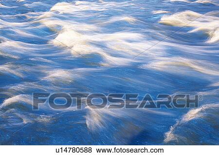 Stock Photo -  a Water Stream, Making Bubbles, High Angle View, Akita Prefecture, Japan. Fotosearch