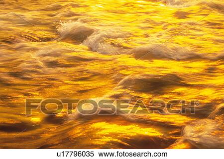 a Water Stream, Orange From the Sun, High Angle View View Large Photo Image Stock Photography - a Water Stream, Orange From the Sun, High Angle View. Fotosearch