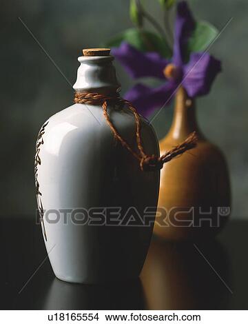 Picture - Flower vase and flower and sake bottle. Fotosearch
