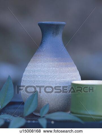 Sake bottle and bamboo cup View Large Photo Image Stock Photo - Sake bottle and bamboo cup. Fotosearch