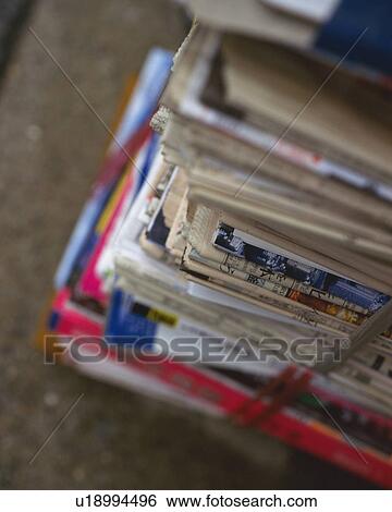 Close up of bundles of newspapers, high angle view View Large Photo Image Stock Photograph - Close up of bundles of newspapers, high angle view. Fotosearch