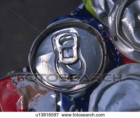 Stock Photo - Close up of crushed aluminum cans for recycling, high angle view, Full Frame. Fotosearch