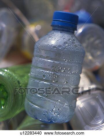 Stock Image - Close up of plastic bottles for recycling, front view, Full Frame, Differential Focus. Fotosearch
