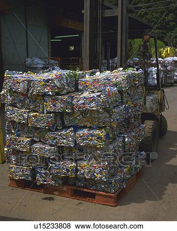 Forklift stacking of crushed cans for recycling, high angle view View Large Photo Image Stock Photo - Forklift stacking of crushed cans for recycling, high angle view. Fotosearch
