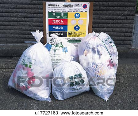 Garbage bags in front of sign board, front view View Large Photo Image Stock Image - Garbage bags in front of sign board, front view. Fotosearch