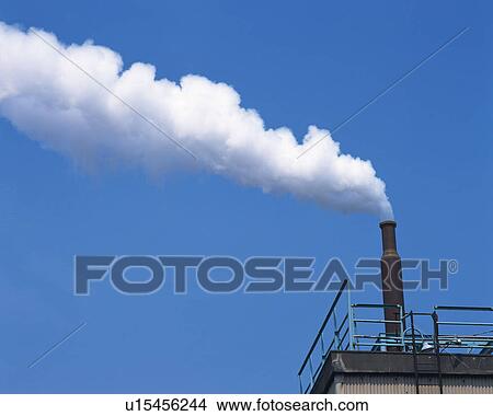 Industrial chimney, low angle view View Large Photo Image Picture - Industrial chimney, low angle view . Fotosearch
