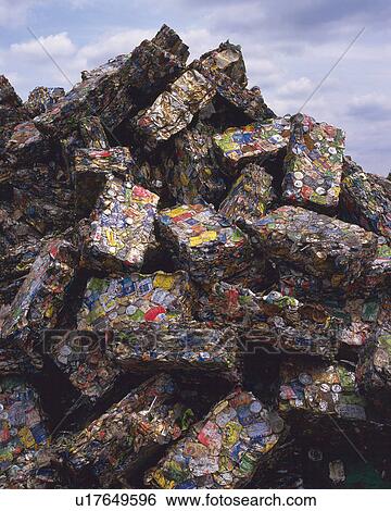 Stock Photograph - Pile of crushed aluminum cans for recycling, low angle view. Fotosearch