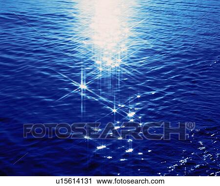 Stock Image - Water Surface and Sunlight, Close Up, Lens Flare. Fotosearch