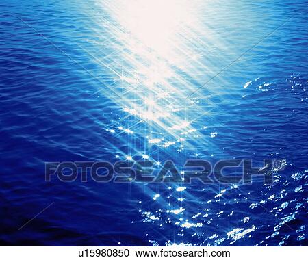 Stock Image - Water Surface and Sunlight, Close Up, Lens Flare. Fotosearch