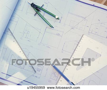 Stock Photo - A blueprint and tools, Close Up, High Angle View. Fotosearch