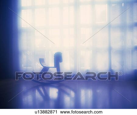 A cockhorse on the floor, Close Up, Soft Focus, Silhouette View Large Photo Image Stock Image - A cockhorse on the floor, Close Up, Soft Focus, Silhouette. Fotosearch
