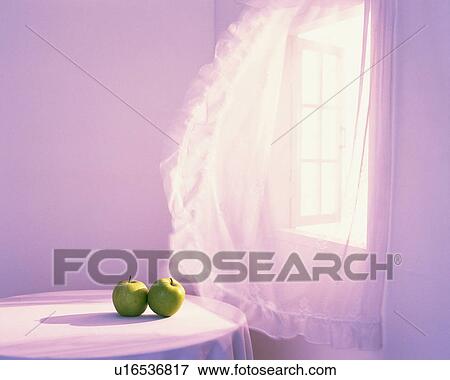 Apples on the table and curtains, High Angle View, Toned Image View Large Photo Image Stock Photo - Apples on the table and curtains, High Angle View, Toned Image. Fotosearch