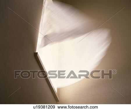 Stock Photo - Curtains waving in the wind, Close Up, Low Angle View, Blurred Motion. Fotosearch