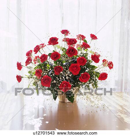 Stock Image - Flowers in the basket, Close Up, High Angle View. Fotosearch