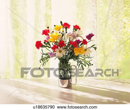Stock Image - Flowers in the vase, Close Up. Fotosearch