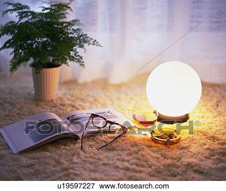 Stock Photo - Lamp and things on the carpet floor, Close Up, High Angle View. Fotosearch