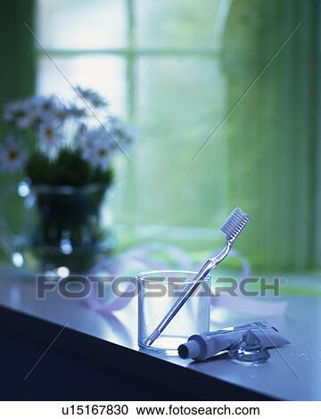 Stock Image - Toothbrush and paste, Close Up, Differential Focus. Fotosearch