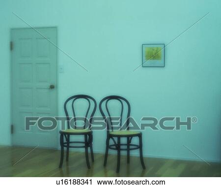 Stock Image - Two chairs and picture in the room, High Angle View, Soft Focus, Toned Image. Fotosearch