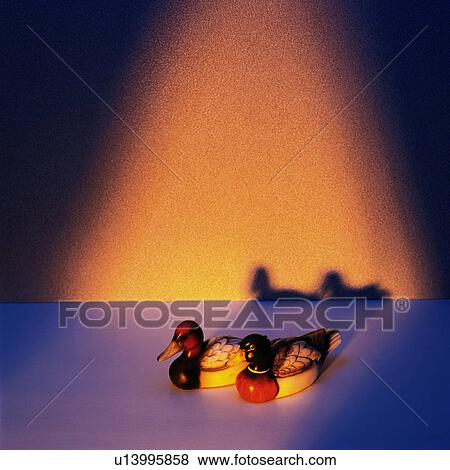 Stock Photo - Two duck ornaments, Close Up, High Angle View. Fotosearch