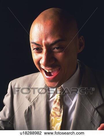 A bald headed businessman shouting, Front View View Large Photo Image Stock Image - A bald headed businessman shouting, Front View. Fotosearch