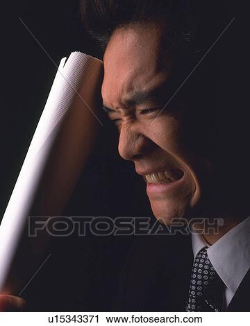 A businessman regretting, Close Up, Side View View Large Photo Image Stock Image - A businessman regretting, Close Up, Side View. Fotosearch