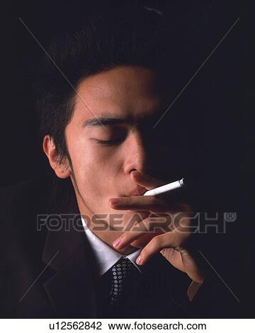A businessman smoking, Front View View Large Photo Image Stock Image - A businessman smoking, Front View. Fotosearch