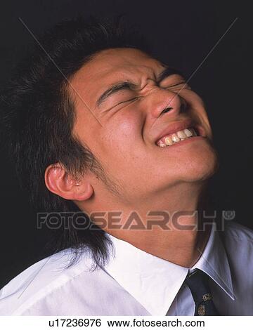 A businessman struggling, Side View View Large Photo Image Stock Photograph - A businessman struggling, Side View. Fotosearch