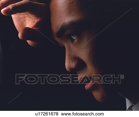 A businessman thinking, Side View View Large Photo Image Stock Photo - A businessman thinking, Side View. Fotosearch