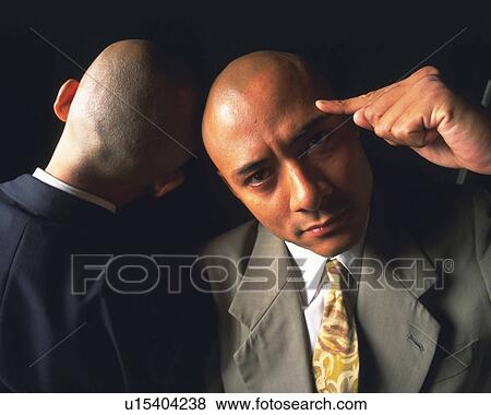 Stock Photo - Two bald headed businessmen posing, Front View, Rear View. Fotosearch