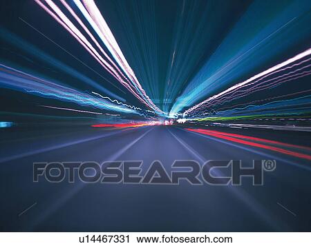 a Highway With Multicolored Lights, Blurred Motion, Long Exposure View Large Photo Image Stock Image - a Highway With Multicolored Lights, Blurred Motion, Long Exposure. Fotosearch