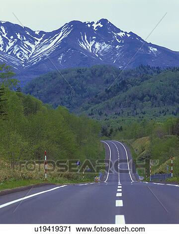 a Mountain Path Leading to a Snowy Mountain, High Angle View View Large Photo Image Stock Image - a Mountain Path Leading to a Snowy Mountain, High Angle View. Fotosearch