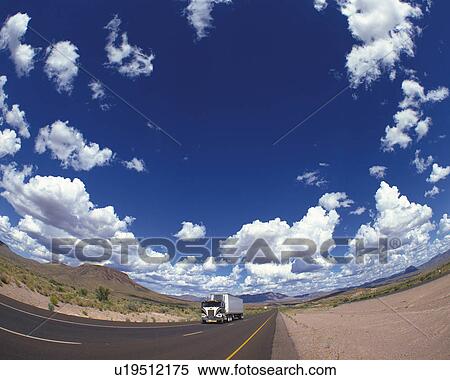 an Asphalt Road Under a Blue Sky, Fish Eye, Low Angle View View Large Photo Image Stock Photography - an Asphalt Road Under a Blue Sky, Fish Eye, Low Angle View. Fotosearch