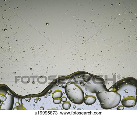 Stock Image -  a Grey-colored Oil, Containing a Lot of Bubbles. Fotosearch