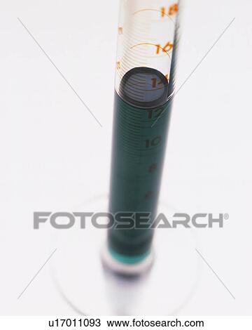 Dark Green-colored Oil in a Measuring Cylinder, High Angle View, Differential Focus View Large Photo Image Stock Image - Dark Green-colored Oil in a Measuring Cylinder, High Angle View, Differential Focus. Fotosearch