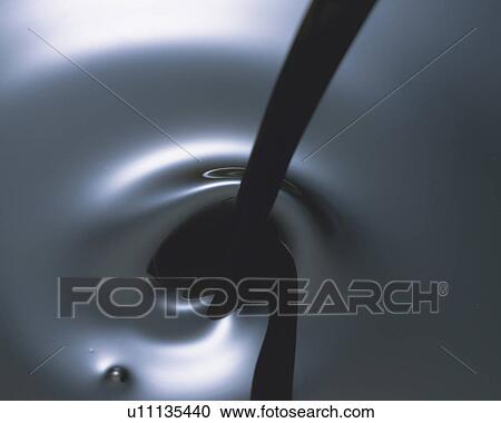 Grey Oil Being Poured, High Angle View View Large Photo Image Stock Image - Grey Oil Being Poured, High Angle View. Fotosearch