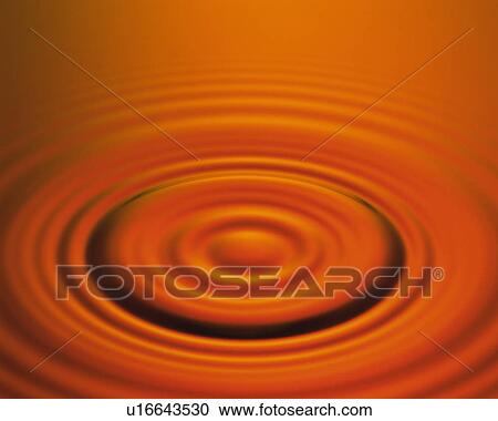 Orange-colored Oil, Making Waves From a Drop, High Angle View View Large Photo Image Stock Image - Orange-colored Oil, Making Waves From a Drop, High Angle View. Fotosearch