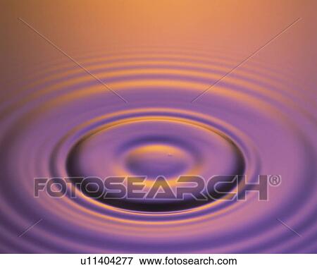 Pink-colored Oil, Making Waves From a Drip, High Angle View View Large Photo Image Stock Photo - Pink-colored Oil, Making Waves From a Drip, High Angle View. Fotosearch