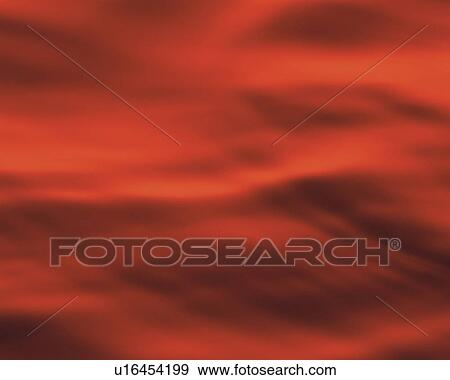 Stock Photo - Red-colored Oil Spreading Across the Surface, Soft Focus. Fotosearch