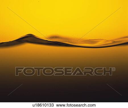 Stock Image - Yellow-colores Liquid, MakingWaves. Fotosearch