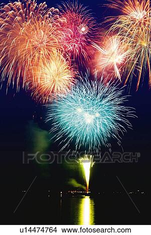 Fireworks exploding in sky, long exposure View Large Photo Image Picture - Fireworks exploding in sky, long exposure. Fotosearch